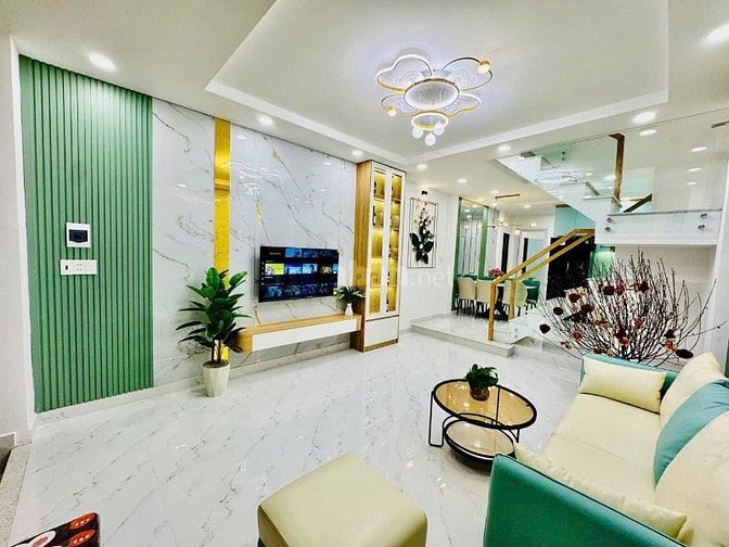Bán nhà Dt 4m Nở Hậu 5m X 13m Đường xe hơi. Xe tải thông. CÓ PN dưới 