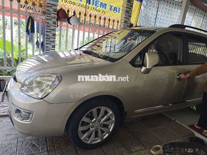 Kia Carens 2010 SX Vàng cát