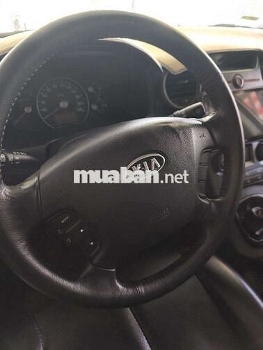 Kia Carens 2010 SX Vàng cát