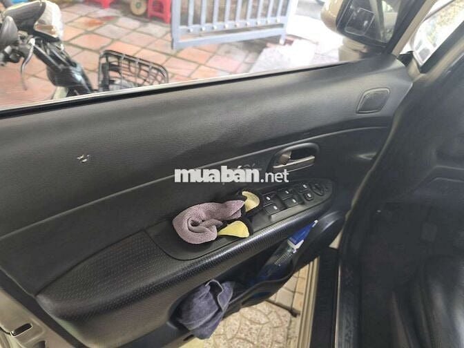 Kia Carens 2010 SX Vàng cát
