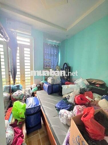 nhà 2 lầu, có sổ hồng mặt tiền đường 8 m