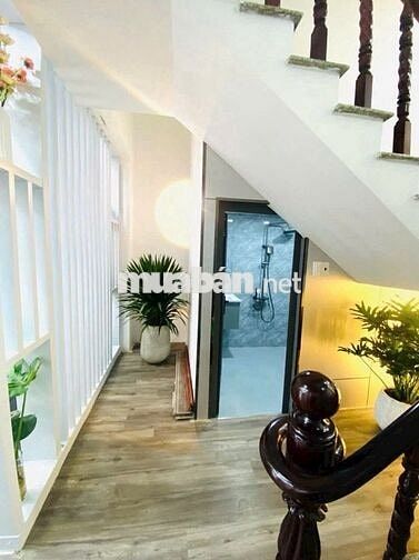Nhà phố trệt 2 lầu. Mặt tiền hẻm chính, oto đỗ cửa tại Thị Trấn NB