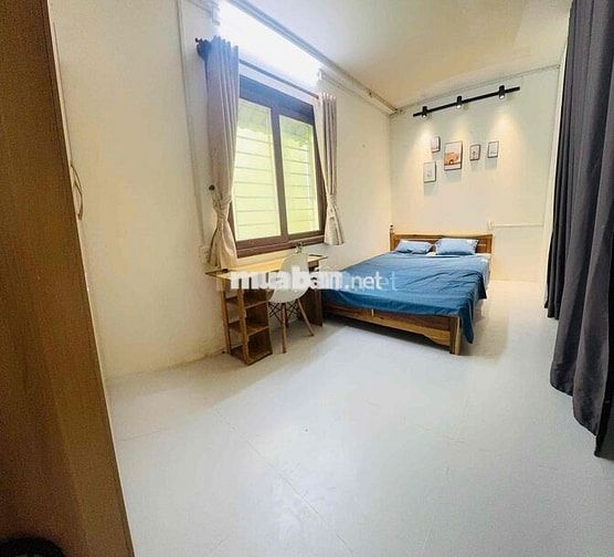 2 phòng ngủ ở lầu 2 nhà mặt tiền LÊ QUANG ĐỊNH.đê được 8 xe máy
