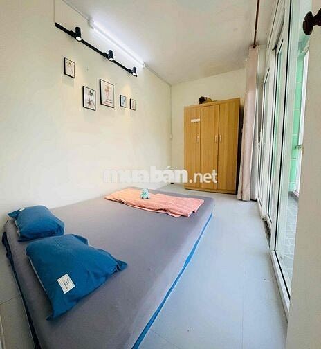 2 phòng ngủ ở lầu 2 nhà mặt tiền LÊ QUANG ĐỊNH.đê được 8 xe máy