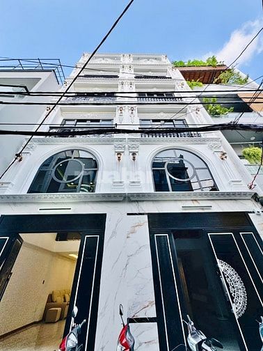 Nhà 6 Lầu thiết kế cổ điển hxh 76/65 Bạch Đằng giá: 14 tỷ
