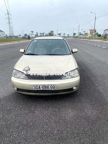 Ford Laser Vàng cát Số sàn
