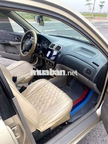 Ford Laser Vàng cát Số sàn
