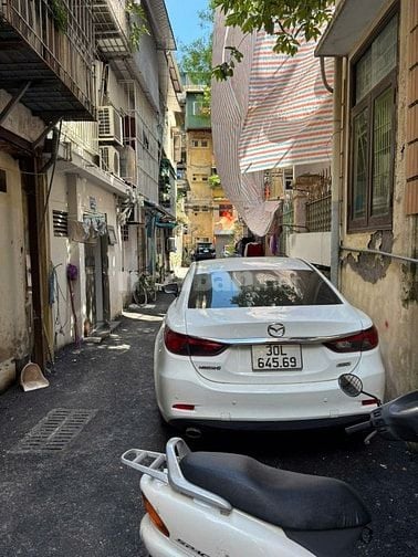 Chính chủ bán xe Mazda 6, màu trắng, sản xuất cuối năm 2014, ĐK 2015