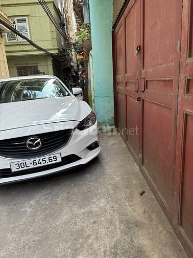 Chính chủ bán xe Mazda 6, màu trắng, sản xuất cuối năm 2014, ĐK 2015