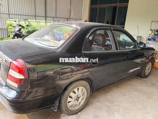 Daewoo Nubira 2 2004 Đen Số sàn