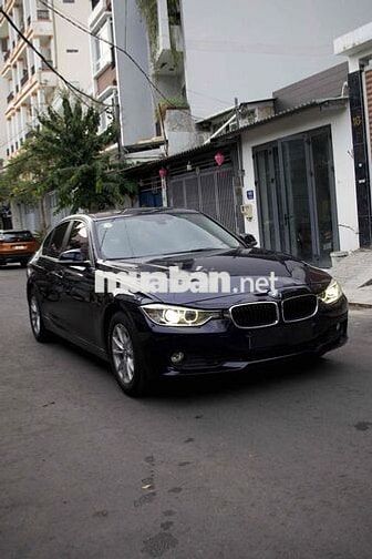 BMW 320i Model 2015 Xanh đen 90000 km