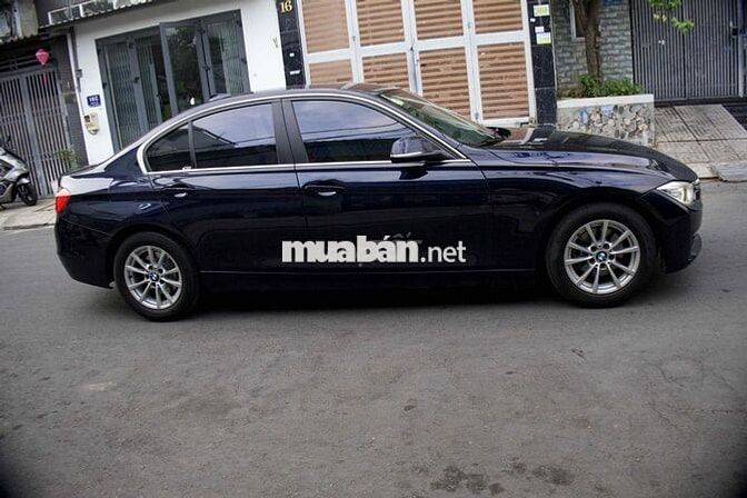 BMW 320i Model 2015 Xanh đen 90000 km