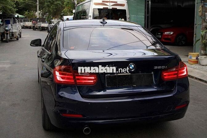 BMW 320i Model 2015 Xanh đen 90000 km