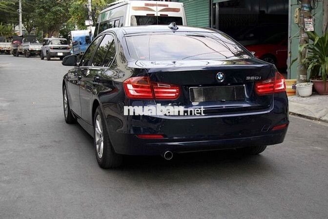 BMW 320i Model 2015 Xanh đen 90000 km