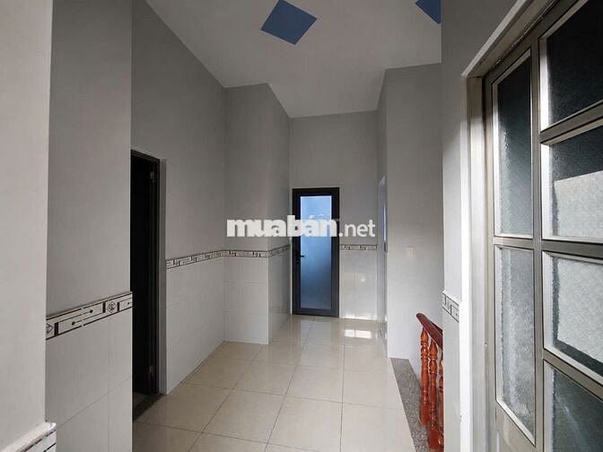 Bán Nhà Chợ Tân Long, P. Dĩ An, TP. HCM. Đường Xe Hơi Đậu Trước Nhà 