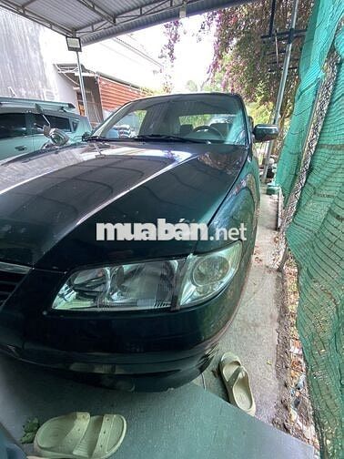 Mazda 626 Xanh đen 5 chỗ