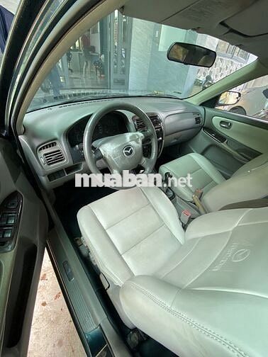 Mazda 626 Xanh đen 5 chỗ