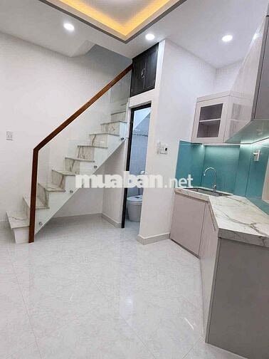 Nhà mới , Trệt lầu lửng , sd 30m2 , Trước nhà 3m , Q4.