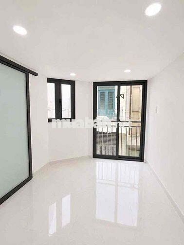 Nhà mới , Trệt lầu lửng , sd 30m2 , Trước nhà 3m , Q4.