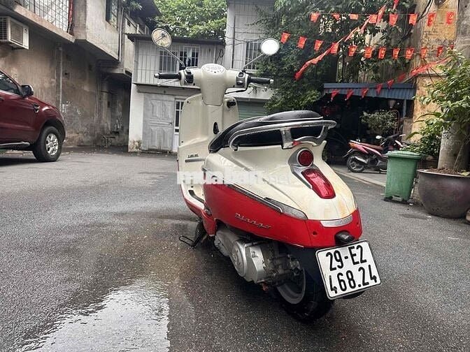 Bán xe máy PEUGOUT màu đỏ trắng