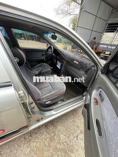 Kia 2004 màu Bạc