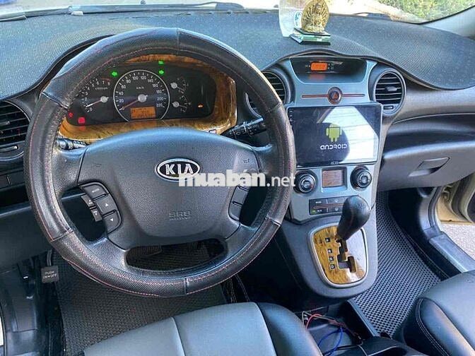 Kia Carens 2010 tu động bao   tranh chấp