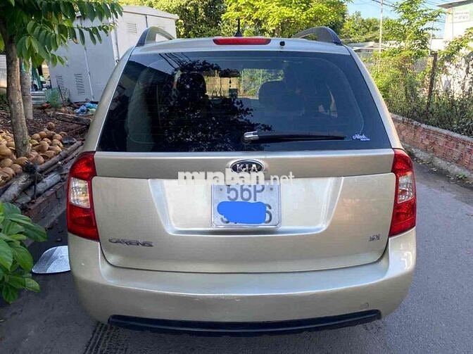 Kia Carens 2010 tu động bao   tranh chấp