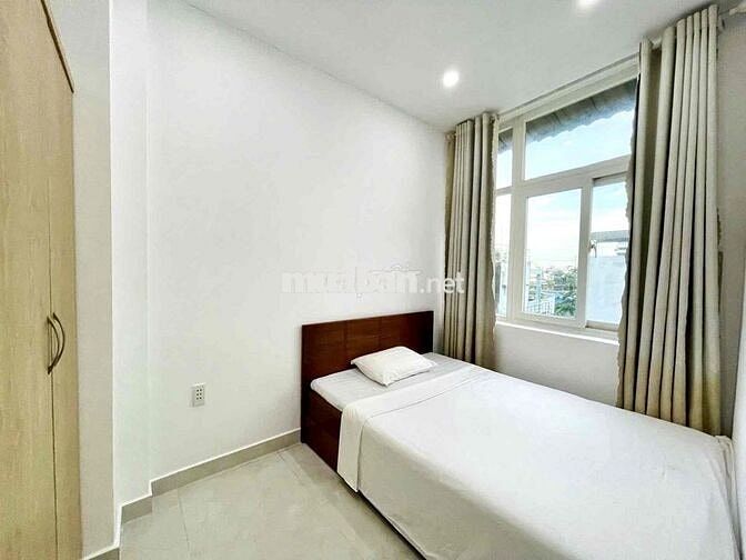 Bán nhà đẹp 4 tầng, xe hơi đậu cửa, 5m ra MT Tôn Thất Thuyết.