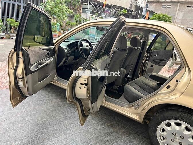 Ford Laser Deluxe 2002 Vàng cát đẹp xuất sắc.
