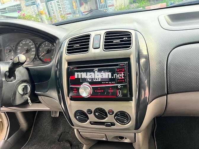Ford Laser Deluxe 2002 Vàng cát đẹp xuất sắc.