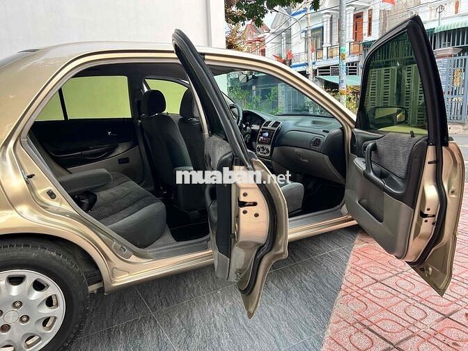 Ford Laser Deluxe 2002 Vàng cát đẹp xuất sắc.