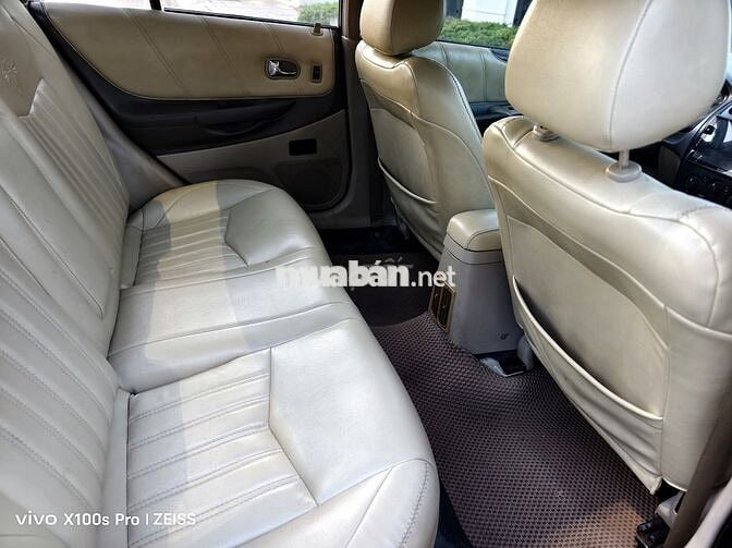 Ford Laser 2004 1.8MT Ghia Đen