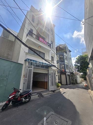 NGỘP BANK GIẢM 1 TỶ- Bán nhà Trường CHinh- 4x14- 5 tầng- 5PN, 6WC MỚI