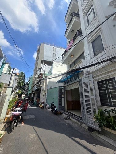 NGỘP BANK GIẢM 1 TỶ- Bán nhà Trường CHinh- 4x14- 5 tầng- 5PN, 6WC MỚI