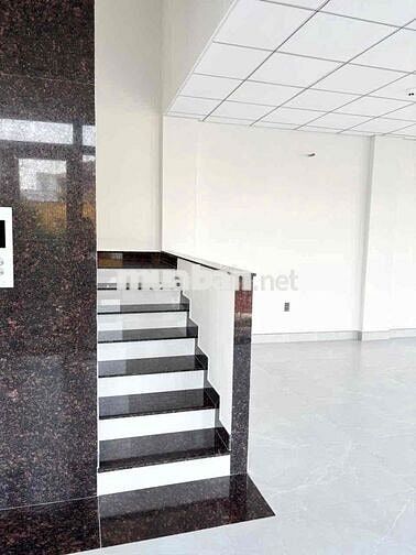 cho thuê toà nhà văn phòng Q7 (góc 2 MT ) đường số tân quy