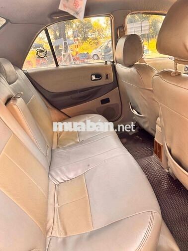 Ford Laser 1.8 GHIA Bạc