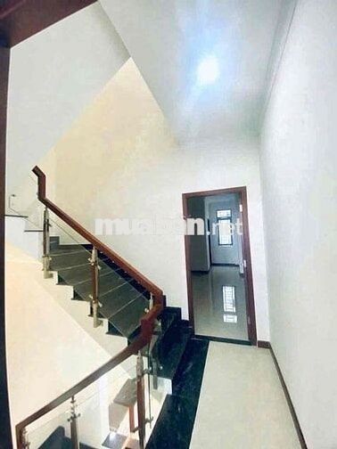 nhà mặt tiền kinh doanh 1 trệt 2 lầu TÂN ĐÔNG HIỆP,đường 12m đông đúc