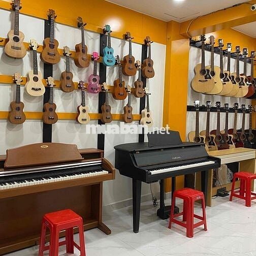 2 THỢ GIA CÔNG ĐÀN GUITAR