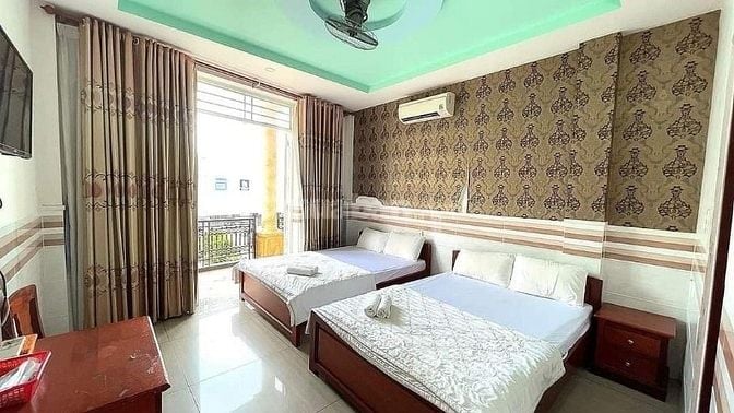 Bán khách sạn MT đường Bờ Bao Tân Thắng gần AeOnMall, 7T nhỉnh 20 tỷ
