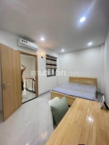 Bán nhà mới 5*20m lầu trệt. Mt nhựa Tân Hiệp. Hocmon