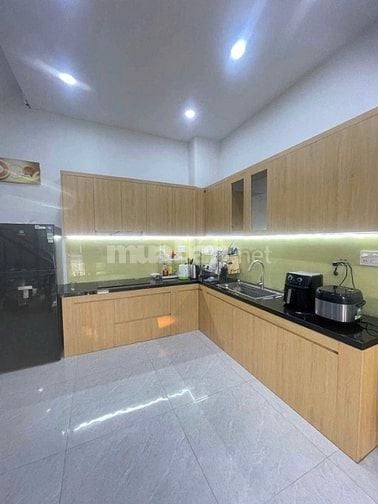 Bán nhà mới 5*20m lầu trệt. Mt nhựa Tân Hiệp. Hocmon