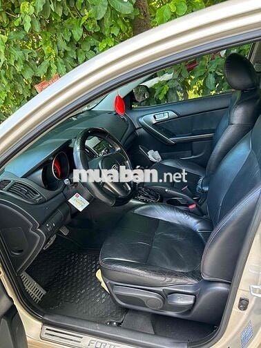 Kia Forte SX 2010 Vàng cát 11000 km