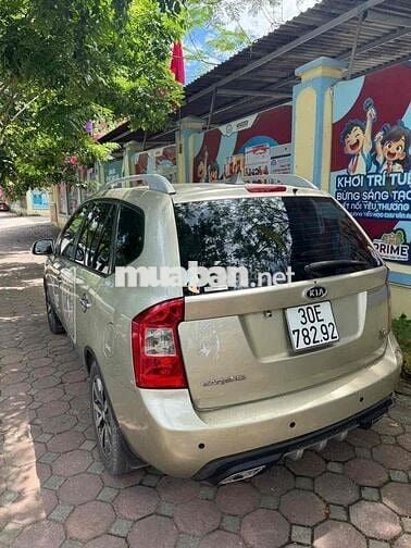 Kia Caren Tự động 7 chỗ Vàng cát