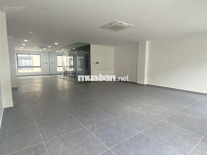 TÒA NHÀ VP ĐƯỜNG LAM SƠN NGAY SÂN BAY. 8X20M. HẦM - 6 TẦNG. SÀN SUỐT.