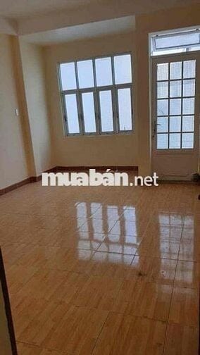phòng 30m2 có giường nệm, kệ, tủ nhỏ