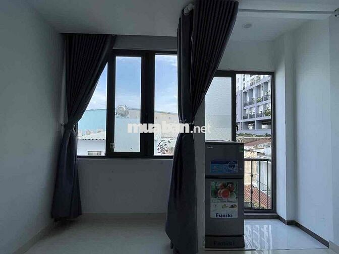 Cho thuê căn hộ Studio ban công,full NT gần lotte,cầu kênh tẻ ,RMIT,..