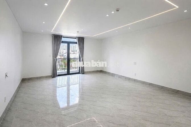 CHÍNH CHỦ CHO THUÊ TÒA NHÀ MẶT TIỀN 1328 QUANG TRUNG THANG MÁY PCCC.
