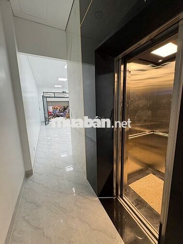 CHÍNH CHỦ CHO THUÊ TÒA NHÀ MẶT TIỀN 1328 QUANG TRUNG THANG MÁY PCCC.