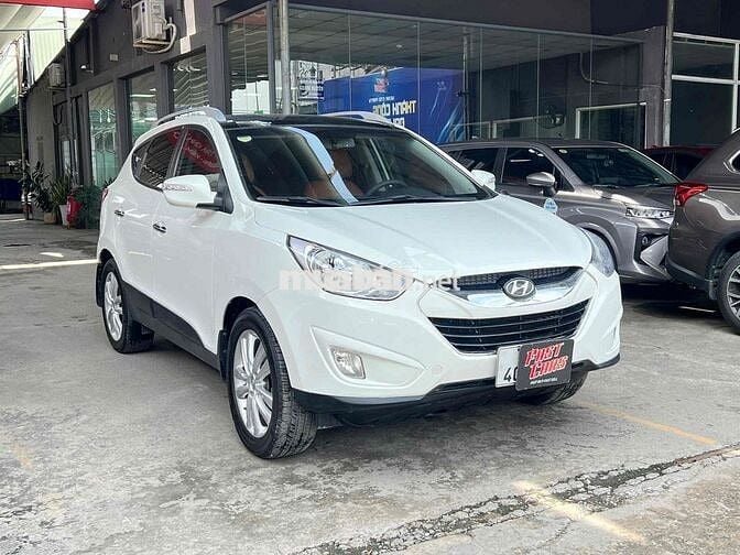 Hyundai Tucson 2011 Trắng 2.0L Tự động Nhập Hàn