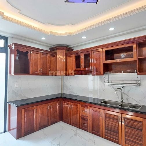 Nhà  MT PHú Định. Ngay góc Võ Văn Kiệt